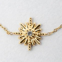 Bracelet soleil doré l15+5cm acier inoxydable+strass