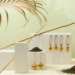 Infuseur de thé en inox doré - Coquillage