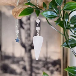 Pendule hexagonal en cristal de roche et charm étoile