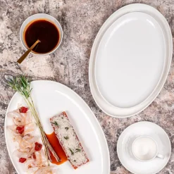 Plat ovale en porcelaine blanche 30x20cm - Ecume
